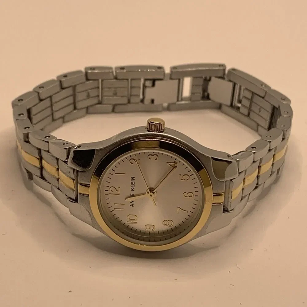 Anne Klein 10-5491SVTT Women's Stainless Steel Analog Silver Dial Watch MGK19